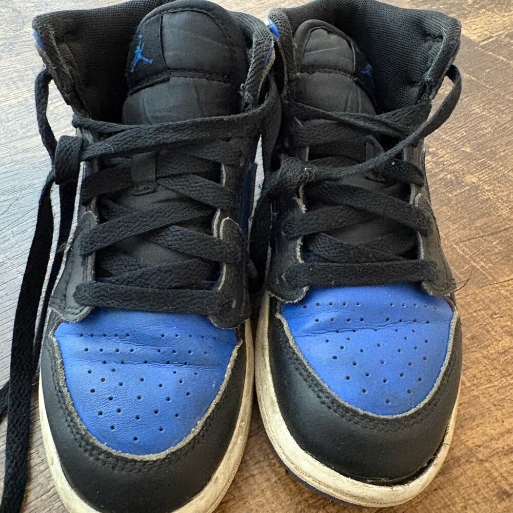 Kids Black and Blue Sneakers. Air Jordan’s